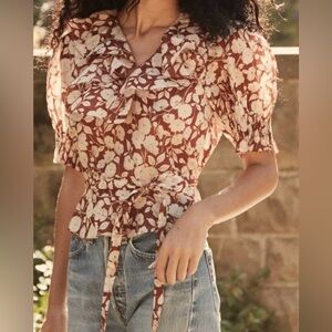 DÔEN Rimbaud top in a red floral print with ruffles.